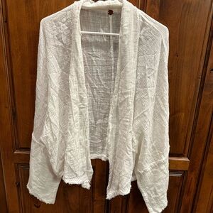 Free People white cardigan with bell sleeves. No tags never worn.